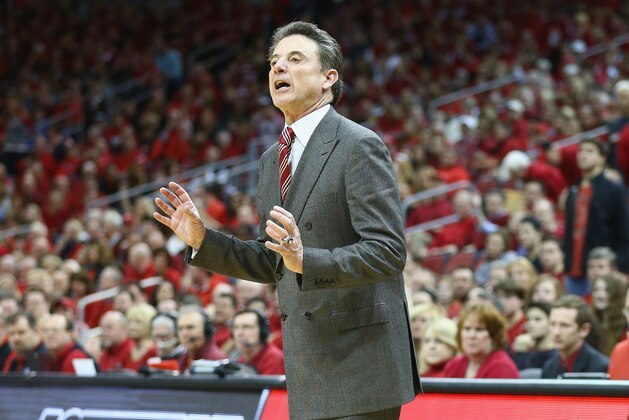 LOUISVILLE, KY - MARCH 08:  Rick Pitino the head coach of the Louisville Cardinals gives instructions to his team during the game against the Connecticut Huskies at KFC YUM! Center on March 8, 2014 in Louisville, Kentucky.  (Photo by Andy Lyons/Getty Images)