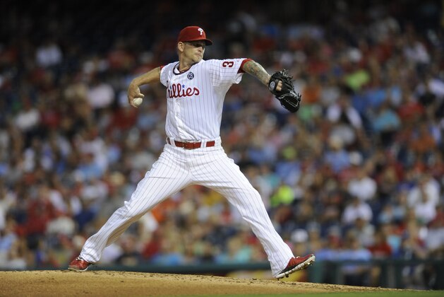 Philadelphia Phillies starting pitcher AJ Burnett throws a pitch during an interleague baseball game against the Seattle Mariners on Tuesday, Aug. 19, 2014, in Philadelphia. (AP Photo/Michael Perez)