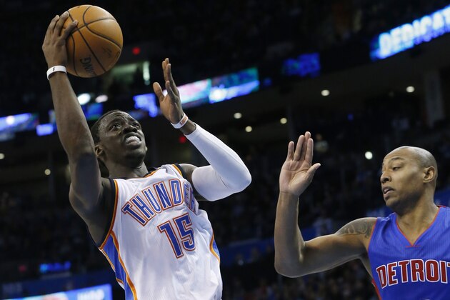 Oklahoma City Thunder's Reggie Jackson (15) shoots in front of Detroit Pistons' Caron Butler (31) during the third quarter of an NBA basketball game in Oklahoma City, Friday, Nov. 14, 2014. Detroit won 96-89 in overtime. (AP Photo/Sue Ogrocki)