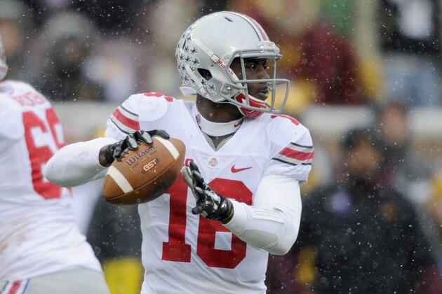 MINNEAPOLIS, MN - NOVEMBER 15: J.T. Barrett #16 of the Ohio State Buckeyes looks to pass the football against the Minnesota Golden Gophers during the second quarter of the game on November 15, 2014 at TCF Bank Stadium in Minneapolis, Minnesota. (Photo by Hannah Foslien/Getty Images)