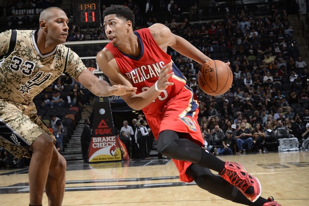 SAN ANTONIO, TX - NOVEMBER 8: Anthony Davis #23 of the New Orleans Pelicans handles the ball against the San Antonio Spurs at the AT&T Center on November 8, 2014 in San Antonio, Texas. NOTE TO USER: User expressly acknowledges and agrees that, by downloading and or using this photograph, user is consenting to the terms and conditions of the Getty Images License Agreement. Mandatory Copyright Notice: Copyright 2014 NBAE (Photos by D. Clarke Evans/NBAE via Getty Images)