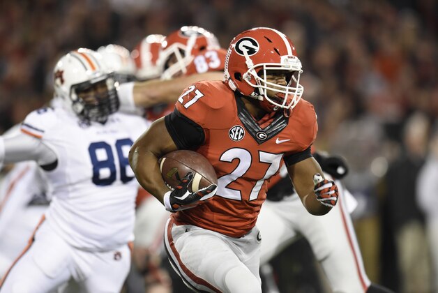 Nov 15, 2014; Athens, GA, USA; Georgia Bulldogs running back Nick Chubb (27) runs against the Auburn Tigers during the first quarter at Sanford Stadium. Mandatory Credit: Dale Zanine-USA TODAY Sports