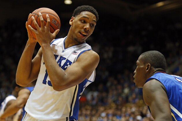 Duke's Jahlil Okafor, left, works against Presbyterian's William Truss, right,  during the first half of an NCAA college basketball game in Durham, N.C., Friday, Nov. 14, 2014. Okafor had 19 points in Duke's 113-44 win. (AP Photo/Karl B DeBlaker)