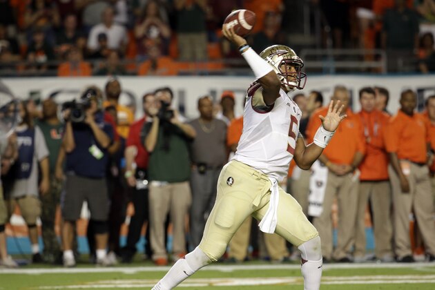 Florida State quarterback Jameis Winston passes in the first half an NCAA college football game against Miami, Saturday, Nov. 15, 2014, in Miami Gardens, Fla. (AP Photo/Lynne Sladky)