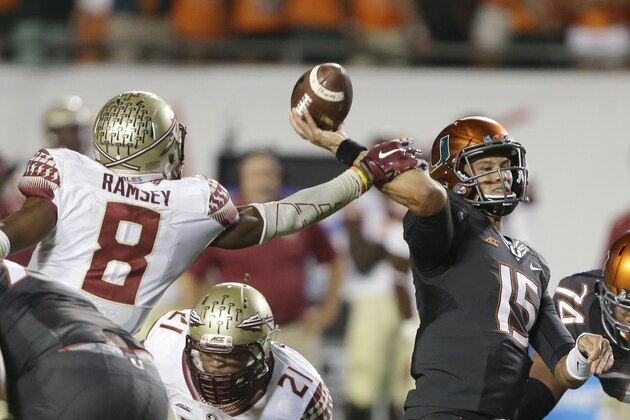 Florida State defensive back Jalen Ramsey (8) blocks a pass by Miami quarterback Brad Kaaya (15) during the second half of an NCAA College football game, Saturday, Nov. 15, 2014 in Miami Gardens, Fla. Florida State defeated Miami 30-26. (AP Photo/Wilfredo Lee)