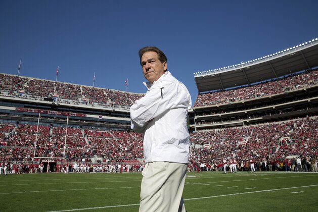 Alabama head coach Nick Saban walks the field before an NCAA college football game against Mississippi State,  Saturday, Nov. 15, 2014, in Tuscaloosa, Ala. (AP Photo/Brynn Anderson)