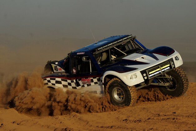 Nov 13, 2014; San Vicente, Baja California, Mexico; SCORE trophy truck  driver Gary Magness races through a silt bed during the Baja 1000. Mandatory Credit: Matt Kartozian-USA TODAY Sports