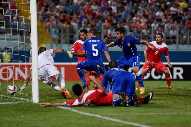 VALLETTA, MALTA - OCTOBER 13:  Graziano Pelle of Italy #17 scores the first goal during the EURO 2016 Group H Qualifier match between Malta and Italy at Ta' Qali Stadium on October 13, 2014 in Valletta, Malta.  (Photo by Claudio Villa/Getty Images)