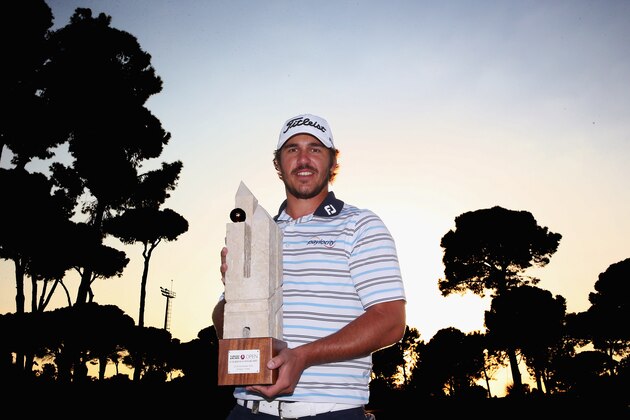 ANTALYA, TURKEY - NOVEMBER 16:  Brooks Koepka of the USA celebrates with the trophy after winning the final round of the 2014 Turkish Airlines Open at The Montgomerie Maxx Royal on November 16, 2014 in Antalya, Turkey.  (Photo by Ian Walton/Getty Images)