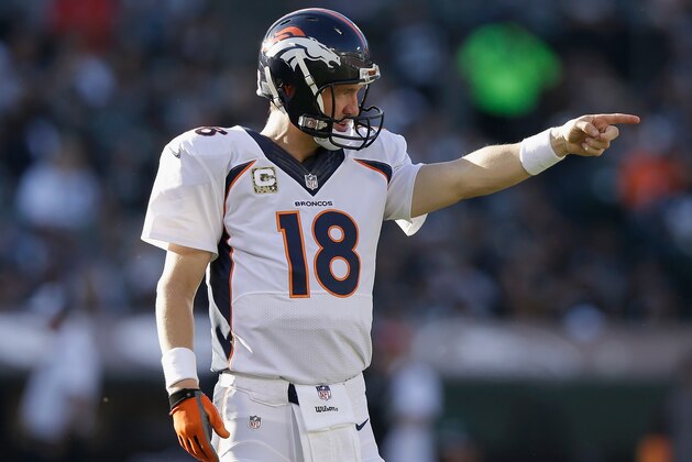 OAKLAND, CA - NOVEMBER 09: Peyton Manning #18 of the Denver Broncos commands his team in the third quarter against the Oakland Raiders at O.co Coliseum on November 9, 2014 in Oakland, California.  (Photo by Ezra Shaw/Getty Images)