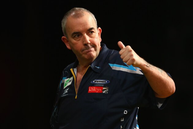 SYDNEY, AUSTRALIA - AUGUST 29:  Phil Taylor of England celebrates during his quarter-final match against Dave Chisnall of England during the Sydney Darts Masters at Hordern Pavilion on August 29, 2014 in Sydney, Australia.  (Photo by Mark Kolbe/Getty Images)