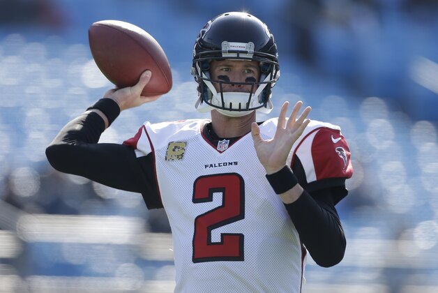 Atlanta Falcons' Matt Ryan (2) warms up before an NFL football game against the Carolina Panthers in Charlotte, N.C., Sunday, Nov. 16, 2014. (AP Photo/Bob Leverone)