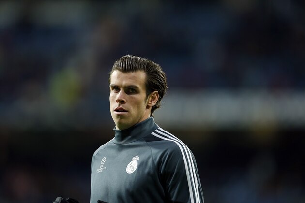 Real Madrid's Gareth Bale looks on before a Group B Champions League soccer match between Real Madrid and Liverpool at the Santiago Bernabeu stadium in Madrid, Spain, Tuesday Nov. 4, 2014. (AP Photo/Paul White)