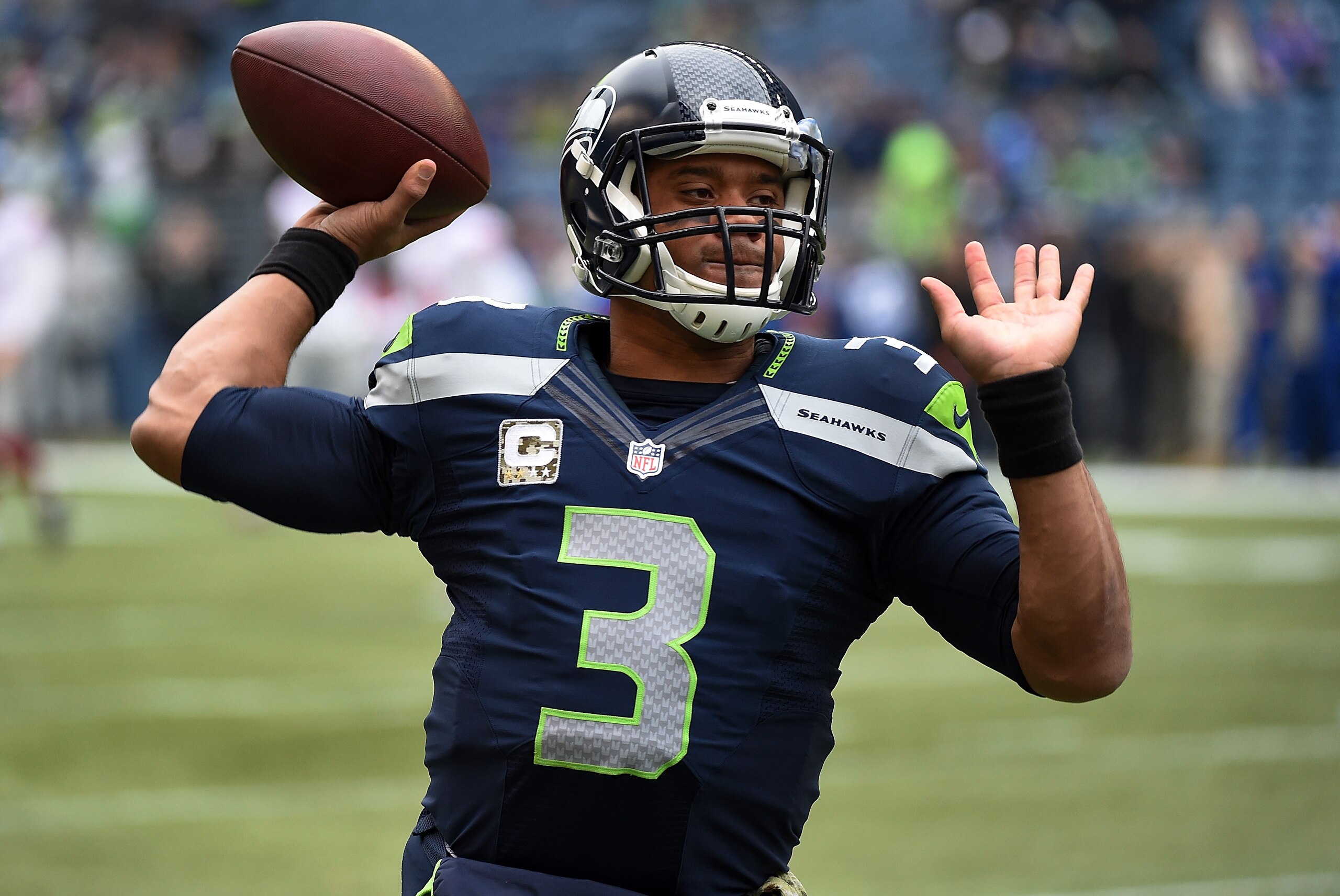 SEATTLE, WA - NOVEMBER 09:  Quarterback Russell Wilson #3 of the Seattle Seahawks warms up before the game against the New York Giants at CenturyLink Field on November 9, 2014 in Seattle, Washington.  (Photo by Steve Dykes/Getty Images)