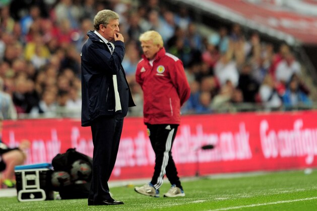 LONDON, ENGLAND - AUGUST 14:  Manager of England Roy Hodgson (L) and Manager of Scotland Gordon Strachan look on during the International Friendly match between England and Scotland at Wembley Stadium on August 14, 2013 in London, England.  (Photo by Shaun Botterill/Getty Images)