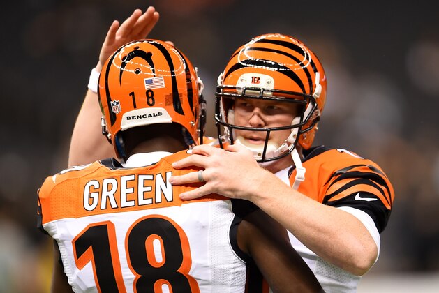 NEW ORLEANS, LA - NOVEMBER 16:  Andy Dalton #14 of the Cincinnati Bengals talks with teammate A.J. Green #18 prior to the start of the game against the New Orleans Saints at Mercedes-Benz Superdome on November 16, 2014 in New Orleans, Louisiana.  (Photo by Stacy Revere/Getty Images)