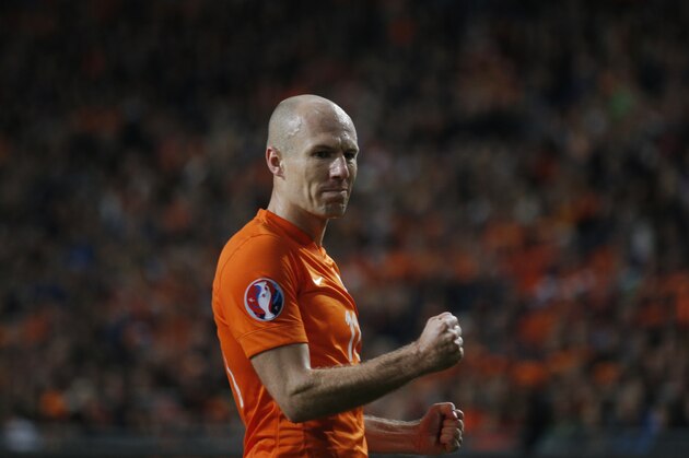 Netherlands' Arjen Robben clenches his fists during the Euro 2016 group A qualifying round soccer match between the Netherlands and Latvia at ArenA stadium in Amsterdam, Netherlands, Sunday, Nov. 16, 2014. (AP Photo/Peter Dejong)