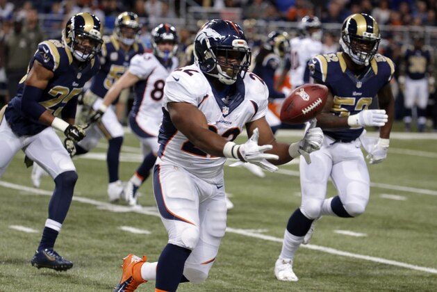 Denver Broncos running back C.J. Anderson catches a pass during the first half of an NFL football game against the St. Louis Rams Sunday, Nov. 16, 2014, in St. Louis. (AP Photo/Charlie Riedel)