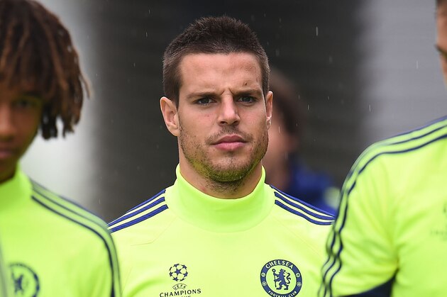 COBHAM, ENGLAND - SEPTEMBER 29:  Cesar Azpilicueta walks out onto the pitch during the Chelsea Training Session at Chelsea Training Ground on September 29, 2014 in Cobham, England.  (Photo by Christopher Lee/Getty Images)