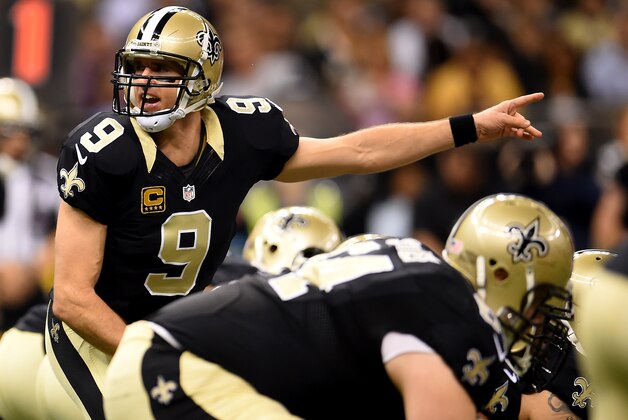 NEW ORLEANS, LA - NOVEMBER 16: Drew Brees #9 of the New Orleans Saints calls a play against the Cincinnati Bengals during the first quarter at Mercedes-Benz Superdome on November 16, 2014 in New Orleans, Louisiana. (Photo by Stacy Revere/Getty Images)