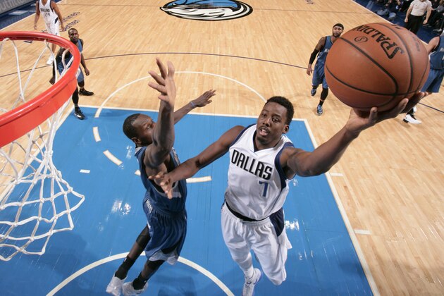 DALLAS, TX - NOVEMBER 15: Al-Farouq Aminu #7 of the Dallas Mavericks goes up for the lay up against the Minnesota Timberwolves on November 15, 2014 at the American Airlines Center in Dallas, Texas. NOTE TO USER: User expressly acknowledges and agrees that, by downloading and or using this photograph, User is consenting to the terms and conditions of the Getty Images License Agreement. Mandatory Copyright Notice: Copyright 2014 NBAE (Photo by Glenn James/NBAE via Getty Images)