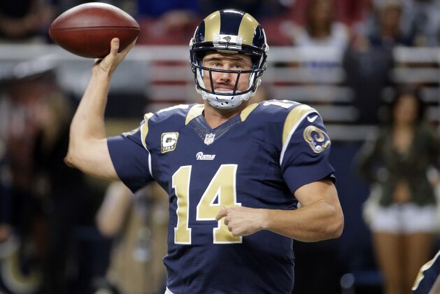 St. Louis Rams quarterback Shaun Hill throws during the first quarter of an NFL football game against the Denver Broncos, Sunday, Nov. 16, 2014, in St. Louis. (AP Photo/Charlie Riedel)