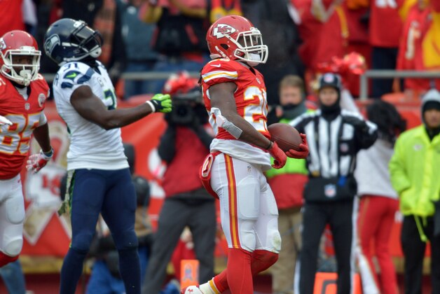 Nov 16, 2014; Kansas City, MO, USA; Kansas City Chiefs running back Jamaal Charles (25) scores a touchdown during the first half against the Seattle Seahawks at Arrowhead Stadium. Mandatory Credit: Denny Medley-USA TODAY Sports