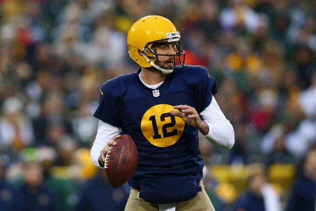GREEN BAY, WI - NOVEMBER 16:  Quarterback  Aaron Rodgers #12 of the Green Bay Packers looks to pass against the Philadelphia Eagles during the first quarter of the game at Lambeau Field on November 16, 2014 in Green Bay, Wisconsin.  (Photo by Ronald Martinez/Getty Images)