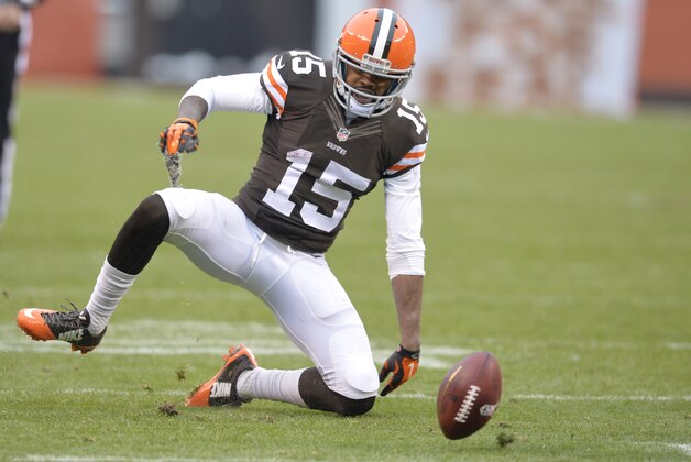 Cleveland Browns' Marlon Moore fumbles on a kick return against the Houston Texans in the third quarter of an NFL football game Sunday, Nov. 16, 2014, in Cleveland. Replay ruled he was down by contact and the Browns kept possession. (AP Photo/David Richard)