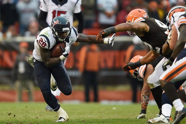 CLEVELAND, OH - NOVEMBER 16:  Alfred Blue #28 of the Houston Texans carries the ball during the fourth quarter against the Cleveland Browns at FirstEnergy Stadium on November 16, 2014 in Cleveland, Ohio.  (Photo by Jason Miller/Getty Images)