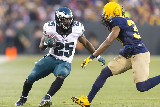 Nov 16, 2014; Green Bay, WI, USA; Philadelphia Eagles running back LeSean McCoy (25) rushes with the football during the first quarter against the Green Bay Packers at Lambeau Field. Mandatory Credit: Jeff Hanisch-USA TODAY Sports