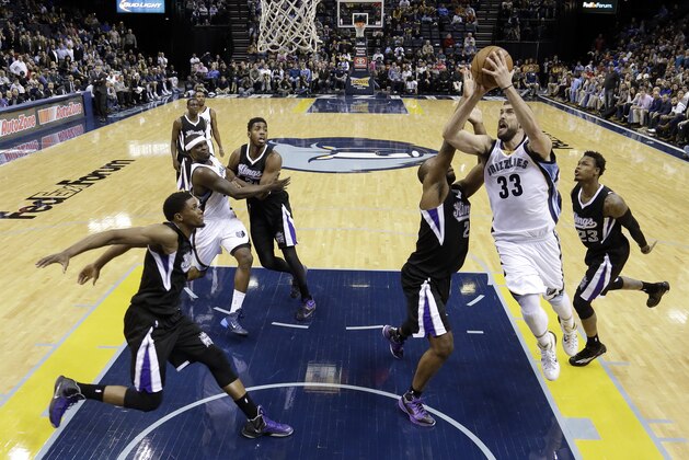 Memphis Grizzlies center Marc Gasol (33) drives against the Sacramento Kings in the second half of an NBA basketball game Thursday, Nov. 13, 2014, in Memphis, Tenn. The Grizzlies won 111-110. (AP Photo/Mark Humphrey)
