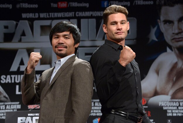 Sep 3, 2014; Los Angeles, CA, USA; Manny Pacquiao (left) and Chris Algieri pose at press conference at Hyatt Regency Century Plaza Hotel in advance of World Welterweight Championship bout on Nov. 22, 2014. Mandatory Credit: Kirby Lee-USA TODAY Sports