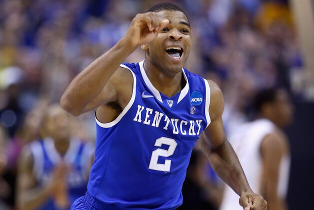 ST LOUIS, MO - MARCH 23:  Andrew Harrison #2 of the Kentucky Wildcats celebrates after defeating the Wichita State Shockers 78 to 76 during the third round of the 2014 NCAA Men's Basketball Tournament at Scottrade Center on March 23, 2014 in St Louis, Missouri.  (Photo by Andy Lyons/Getty Images)