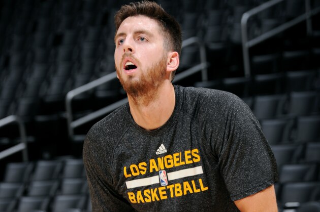 LOS ANGELES, CA - NOVEMBER 04: Ryan Kelly #4 of the Los Angeles Lakers warms up before a game against the Phoenix Suns at STAPLES Center on November 04, 2014 in Los Angeles, California. NOTE TO USER: User expressly acknowledges and agrees that, by downloading and/or using this Photograph, user is consenting to the terms and conditions of the Getty Images License Agreement. Mandatory Copyright Notice: Copyright 2014 NBAE (Photo by Andrew D. Bernstein/NBAE via Getty Images)