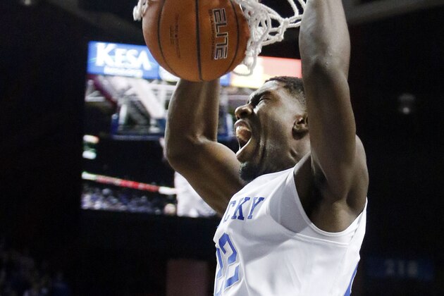 Kentucky's Alex Poythress dunks during the second half of an NCAA college basketball game against Buffalo, Sunday, Nov. 16, 2014, in Lexington, Ky. Kentucky won 71-52. (AP Photo/James Crisp)