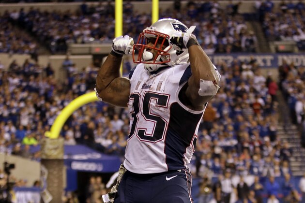 New England Patriots running back Jonas Gray celebrates a touchdown against the Indianapolis Colts during the second half of an NFL football game in Indianapolis, Sunday, Nov. 16, 2014. (AP Photo/AJ Mast)