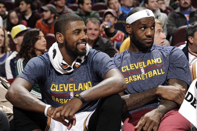 CLEVELAND, OH - OCTOBER 5:  Kyrie Irving #2 and LeBron James #23 of the Cleveland Cavaliers on the bench during the game against Maccabi Tel Aviv at The Quicken Loans Arena on October 16, 2014 in Cleveland, Ohio. NOTE TO USER: User expressly acknowledges and agrees that, by downloading and/or using this Photograph, user is consenting to the terms and conditions of the Getty Images License Agreement. Mandatory Copyright Notice: Copyright 2014 NBAE (Photo by David Liam Kyle/NBAE via Getty Images)