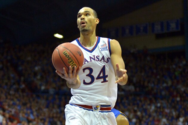 Nov 14, 2014; Lawrence, KS, USA; Kansas Jayhawks forward Perry Ellis (34) shoots a layup during the second half against the UC Santa Barbara Gauchos at Allen Fieldhouse. Kansas won 69 - 59. Mandatory Credit: Denny Medley-USA TODAY Sports