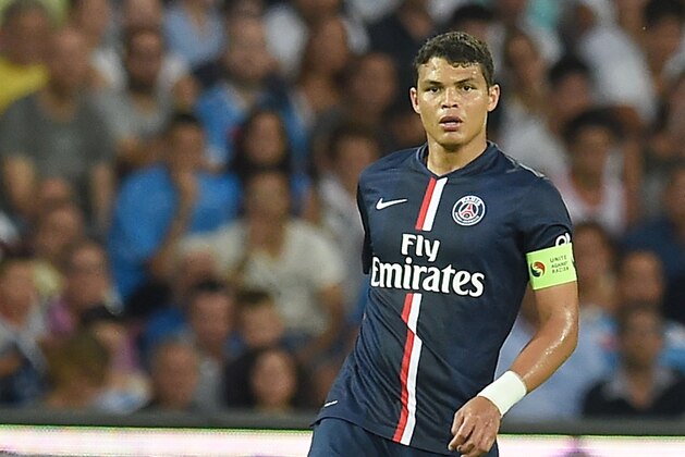 NAPLES, ITALY - AUGUST 11:  Thiago Silva of Paris Saint Germain  in action during the pre-season friendly match between SSC Napoli and Paris Saint-Germain FC at Stadio San Paolo on August 11, 2014 in Naples, Italy.  (Photo by Giuseppe Bellini/Getty Images)