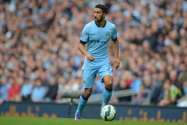 MANCHESTER, ENGLAND - OCTOBER 18: Gael Clichy of Manchester City in action during the Barclays Premier League match between Manchester City and Tottenham Hotspur at the Etihad Stadium on October 18, 2014 in Manchester, England.  (Photo by Michael Regan/Getty Images)