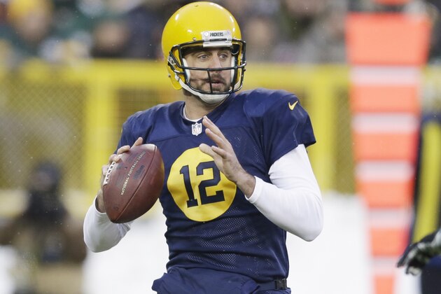 Green Bay Packers' Aaron Rodgers throws during the first half of an NFL football game against the Philadelphia Eagles Sunday, Nov. 16, 2014, in Green Bay, Wis. (AP Photo/Tom Lynn)