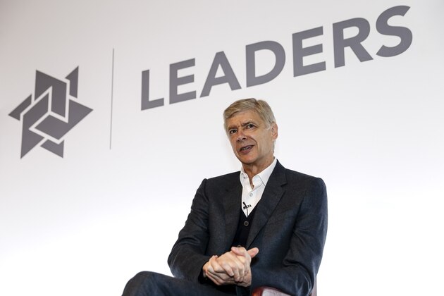 LONDON, ENGLAND - NOVEMBER 12:  Manager Arsene Wenger of Arsenal FC (R) speaks during day one of the Leaders Sport Performance Summit at the Emirates Stadium on November 12, 2014 in London, England.  (Photo by Miles Willis/Getty Images)