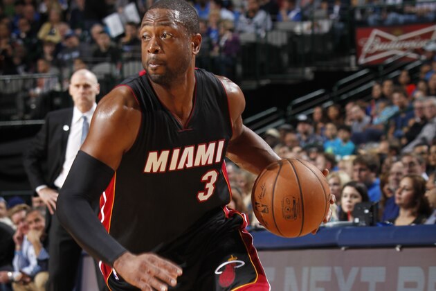 DALLAS, TX - NOVEMBER 9: Dwyane Wade #3 of the Miami Heat handles the ball against the Dallas Mavericks on November 9, 2014 at the American Airlines Center in Dallas, Texas. NOTE TO USER: User expressly acknowledges and agrees that, by downloading and or using this photograph, User is consenting to the terms and conditions of the Getty Images License Agreement. Mandatory Copyright Notice: Copyright 2014 NBAE (Photo by Glenn James/NBAE via Getty Images)