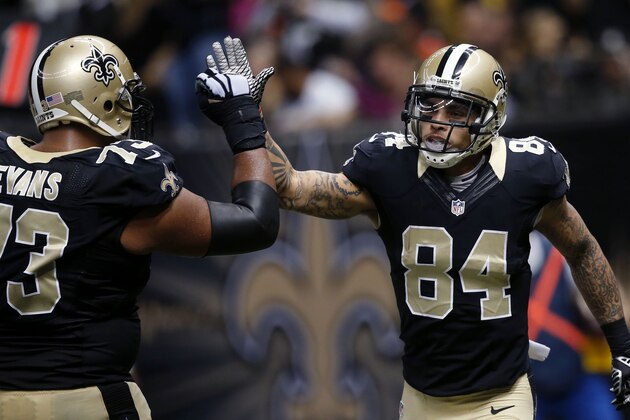 New Orleans Saints wide receiver Kenny Stills (84) celebrates his touchdown reception with guard Jahri Evans (73) in the second half of an NFL football game in New Orleans, Sunday, Nov. 16, 2014. (AP Photo/Bill Haber)