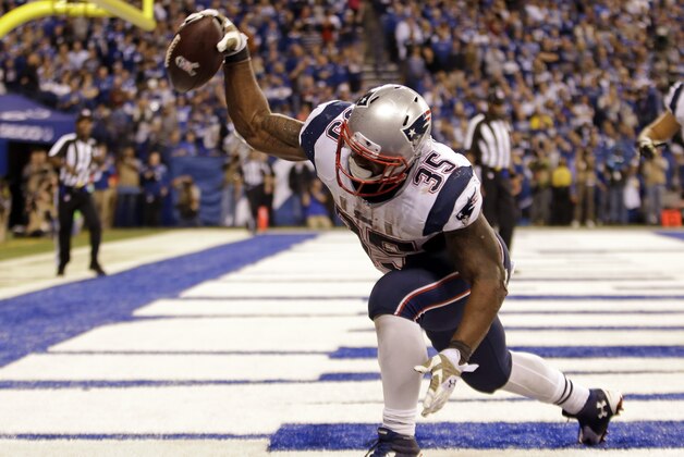 New England Patriots running back Jonas Gray celebrates a touchdown against the Indianapolis Colts during the second half of an NFL football game in Indianapolis, Sunday, Nov. 16, 2014. (AP Photo/AJ Mast)