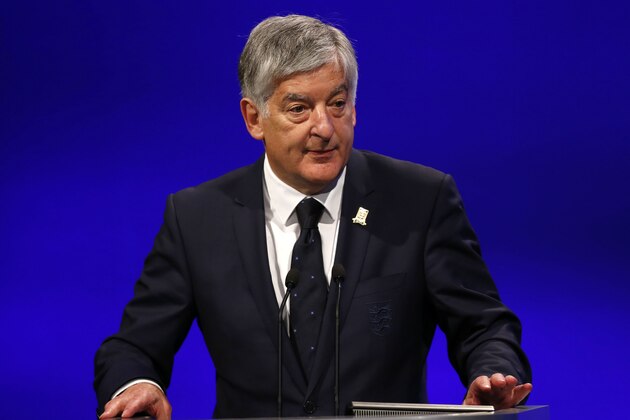 Chairman of English Football Association David Bernstein addresses the delegates during the 37th Ordinary UEFA Congress in London, Friday, May 24, 2013. (AP Photo/Sang Tan)