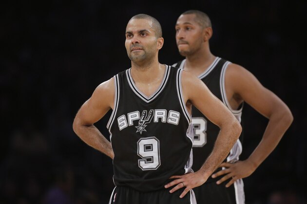 San Antonio Spurs' Tony Parker, of France, watches during the first half of an NBA basketball game against the Los Angeles Lakers Friday, Nov. 14, 2014, in Los Angeles. (AP Photo/Jae C. Hong)