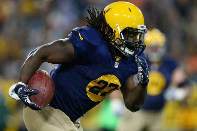 GREEN BAY, WI - NOVEMBER 16:   Eddie Lacy #27 of the Green Bay Packers runs the ball against the Philadelphia Eagles during the second quarter of the game at Lambeau Field on November 16, 2014 in Green Bay, Wisconsin.  (Photo by Ronald Martinez/Getty Images)