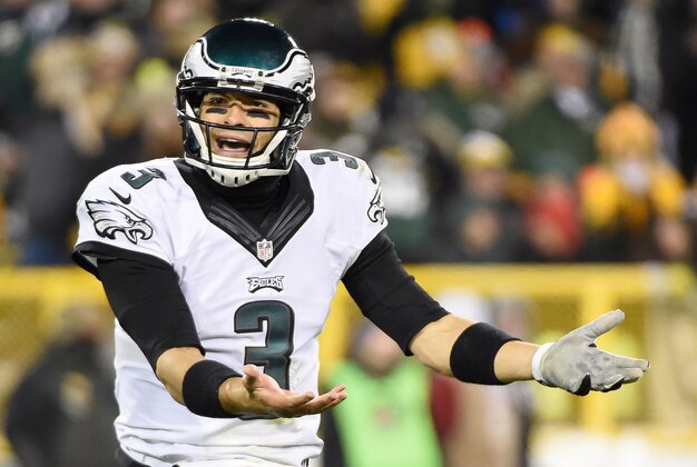 Nov 16, 2014; Green Bay, WI, USA;  Philadelphia Eagles quarterback Mark Sanchez (3) reacts after throwing an interception in the fourth quarter against the Green Bay Packers at Lambeau Field. Mandatory Credit: Benny Sieu-USA TODAY Sports